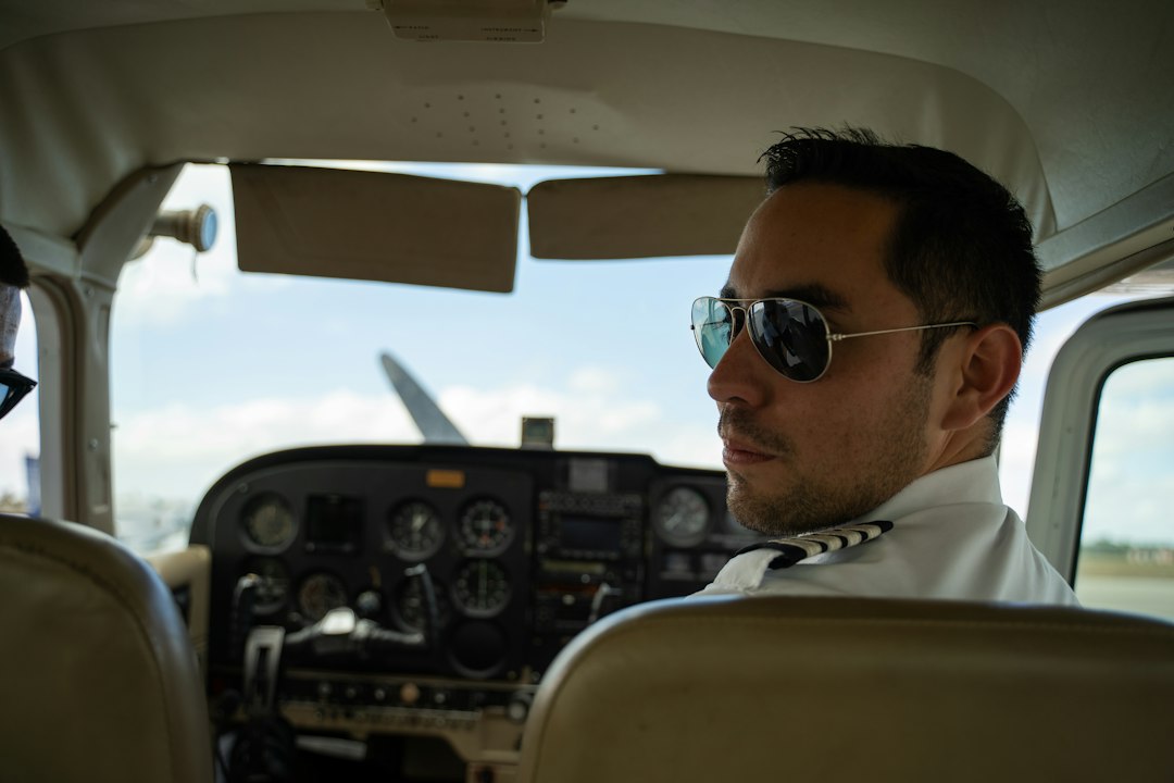 Captain and First Officer collaborating in modern aircraft flight deck